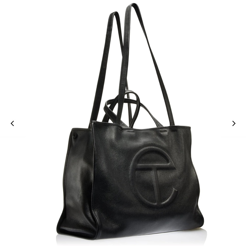 ISO IN SEARCH OF! Telfar x Wilson’s Leather Large Carry Bag Black